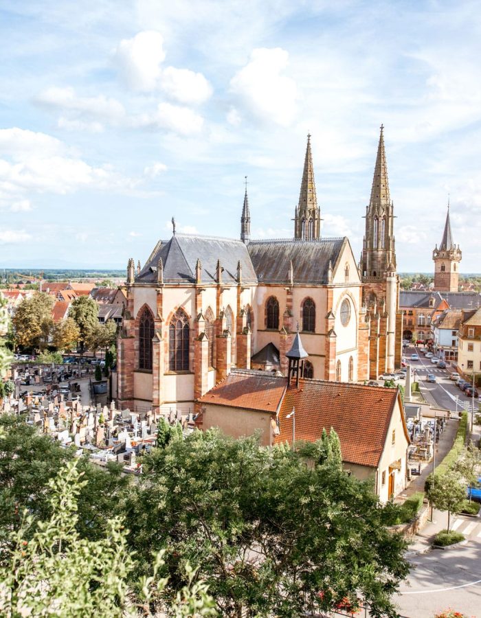 cityscape-view-on-the-old-cathedral-and-tower-in-obernai-village-during-the-sunny-day-in-alsace-region-france-1.jpg