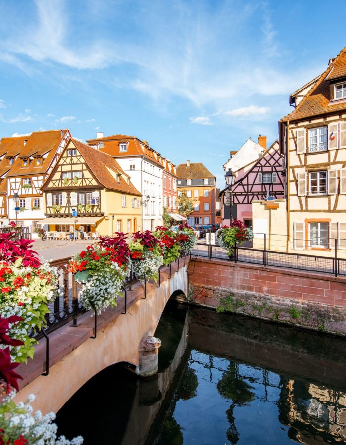 landscape-view-on-the-beautiful-colorful-buildings-on-the-water-channel-in-the-famous-tourist-town-colmar-in-alsace-region-france-scaled.jpg