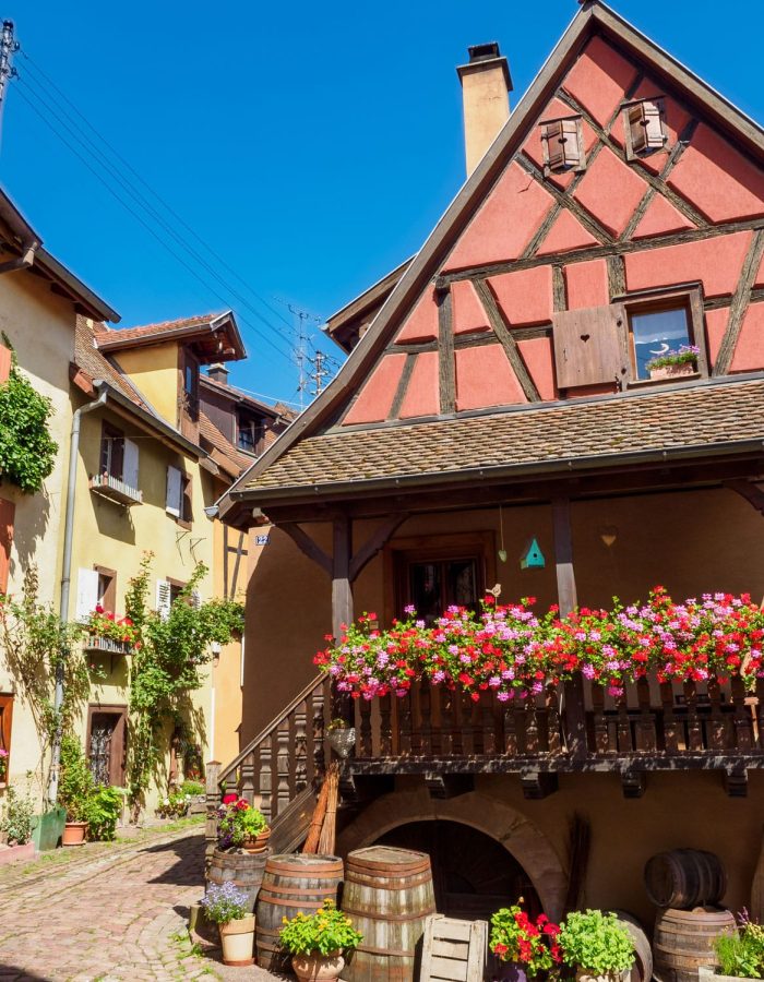 street-with-colorful-traditional-french-houses-in-eguisheim-france.jpg
