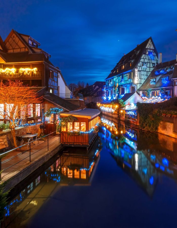 traditional-alsatian-half-timbered-houses-and-river-lauch-in-petite-venise-or-little-venice-old-town-of-colmar-decorated-and-illuminated-at-christmas-time-alsace-france-scaled.jpg